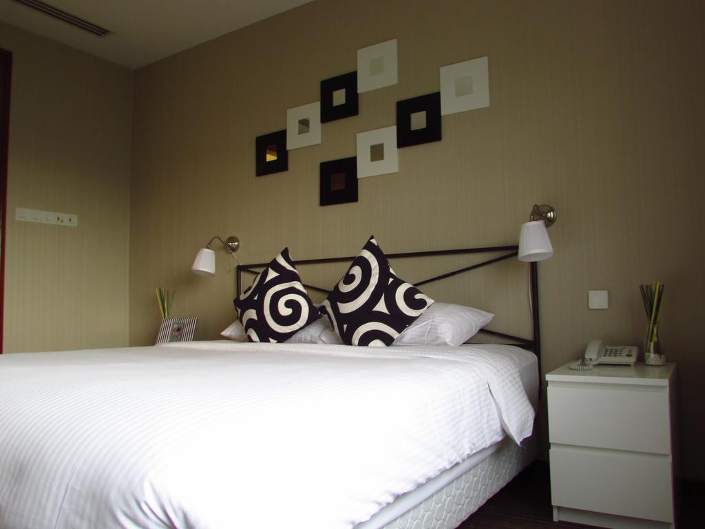 سنغافورة Alocassia Serviced Apartments الغرفة الصورة