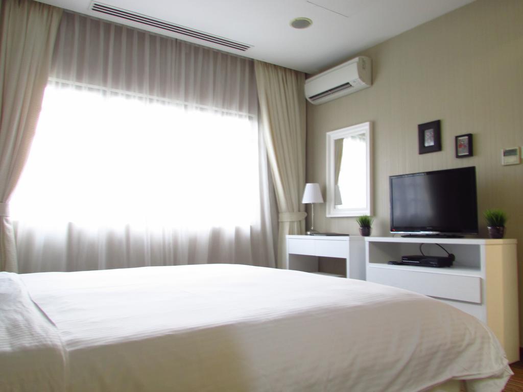 سنغافورة Alocassia Serviced Apartments الغرفة الصورة